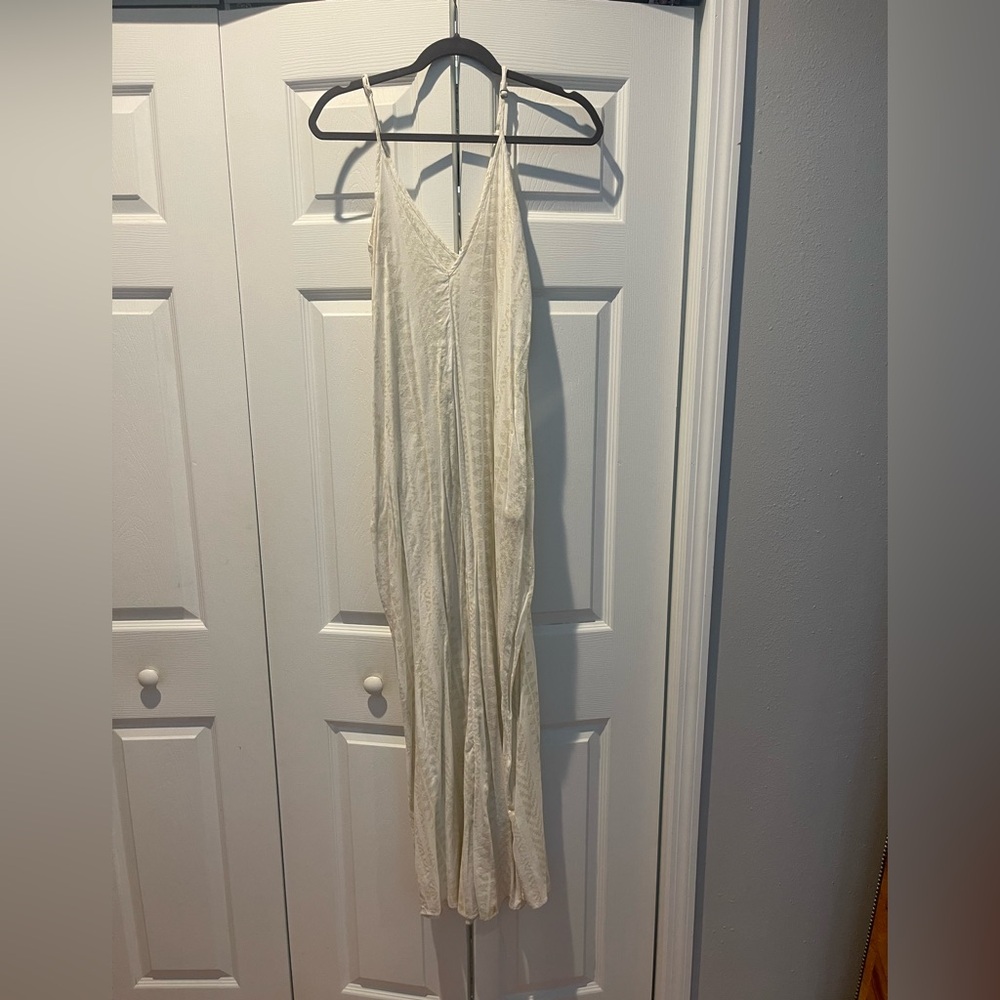 Elan Coverup or dress. V-neckline with adjustable spaghetti straps